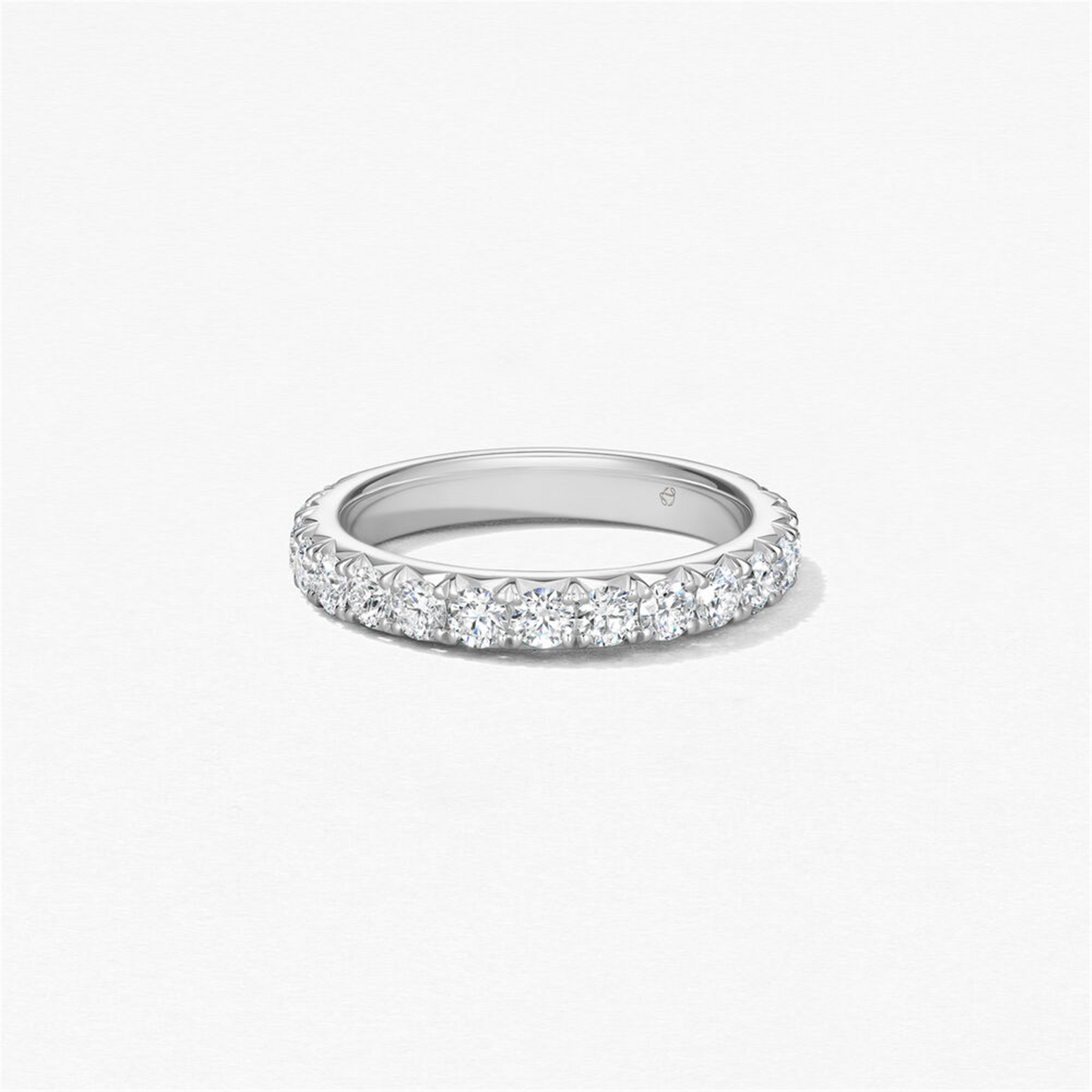 The Hearts on Fire Platinum Vela French Cut Pavé Band