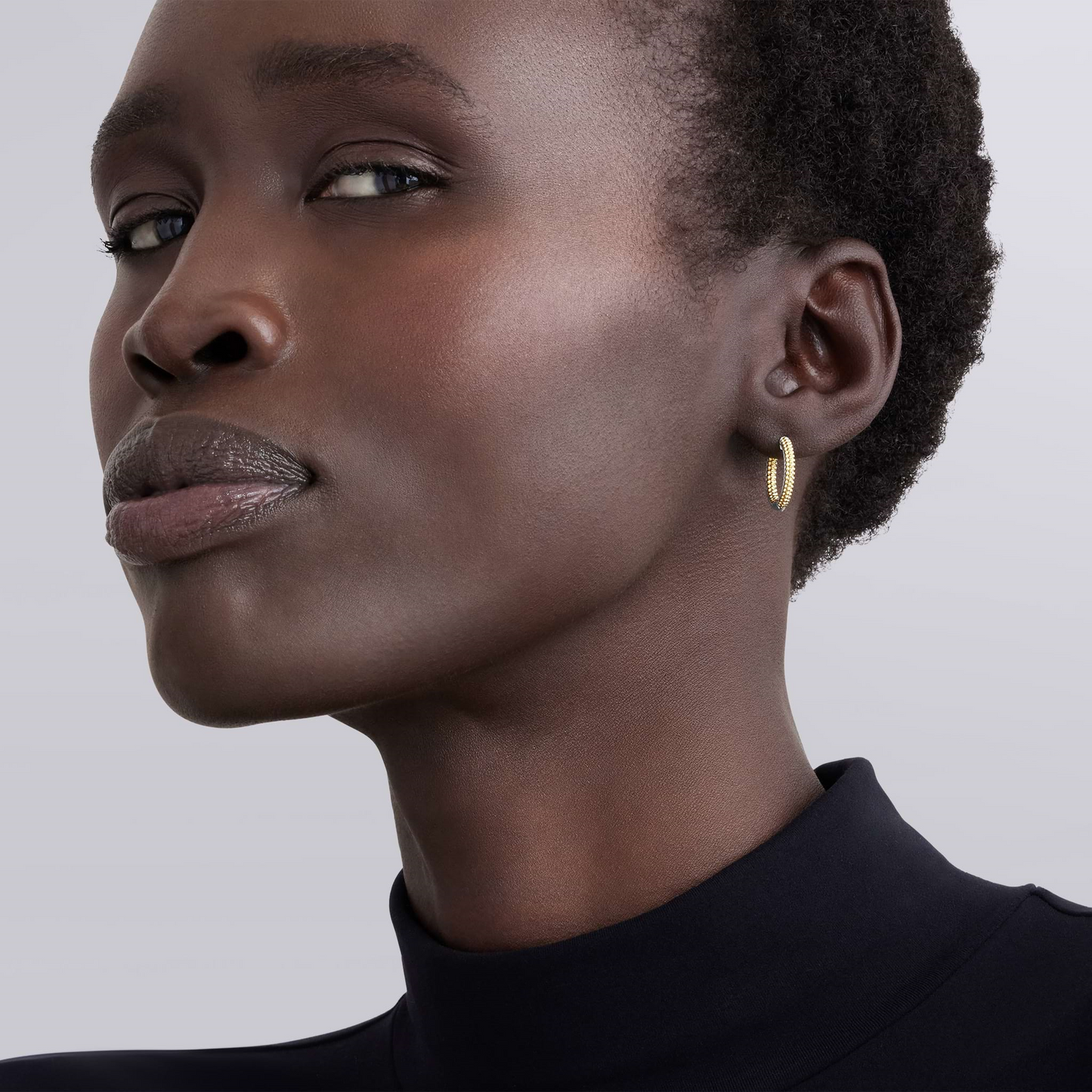 Lagos Two-Tone Caviar Huggie Earrings in Sterling Silver and 18k Gold