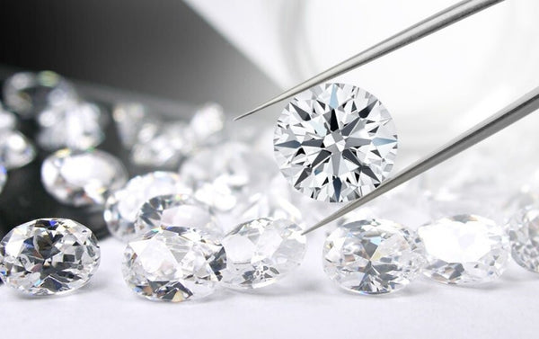 Loose Natural Diamonds with Needle-Nosed Pliers